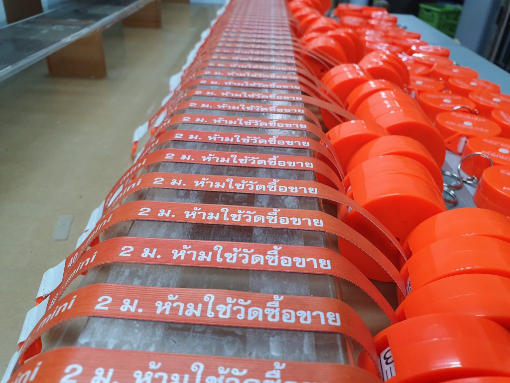 พิมพ์ข้อความห้ามใช้วัดซื้อขาย ลงบนสายตลับเมตร